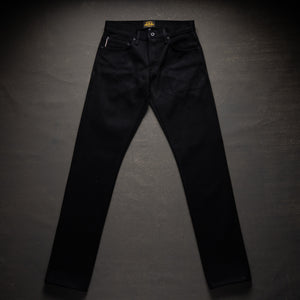 Black jeans on a dark gray background